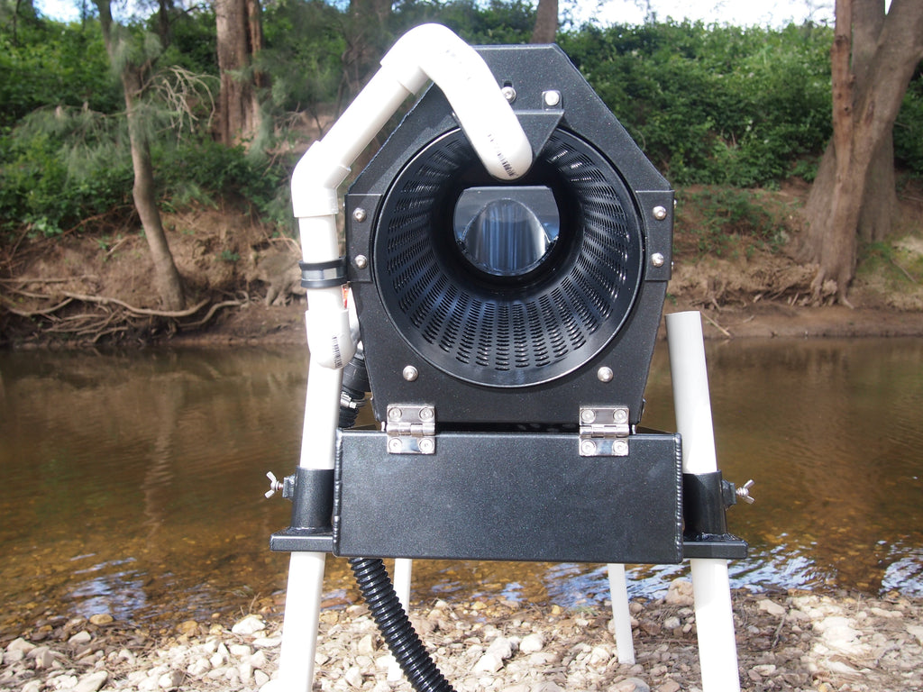 Rear view of trommel looking up into barrel and internal spray bar